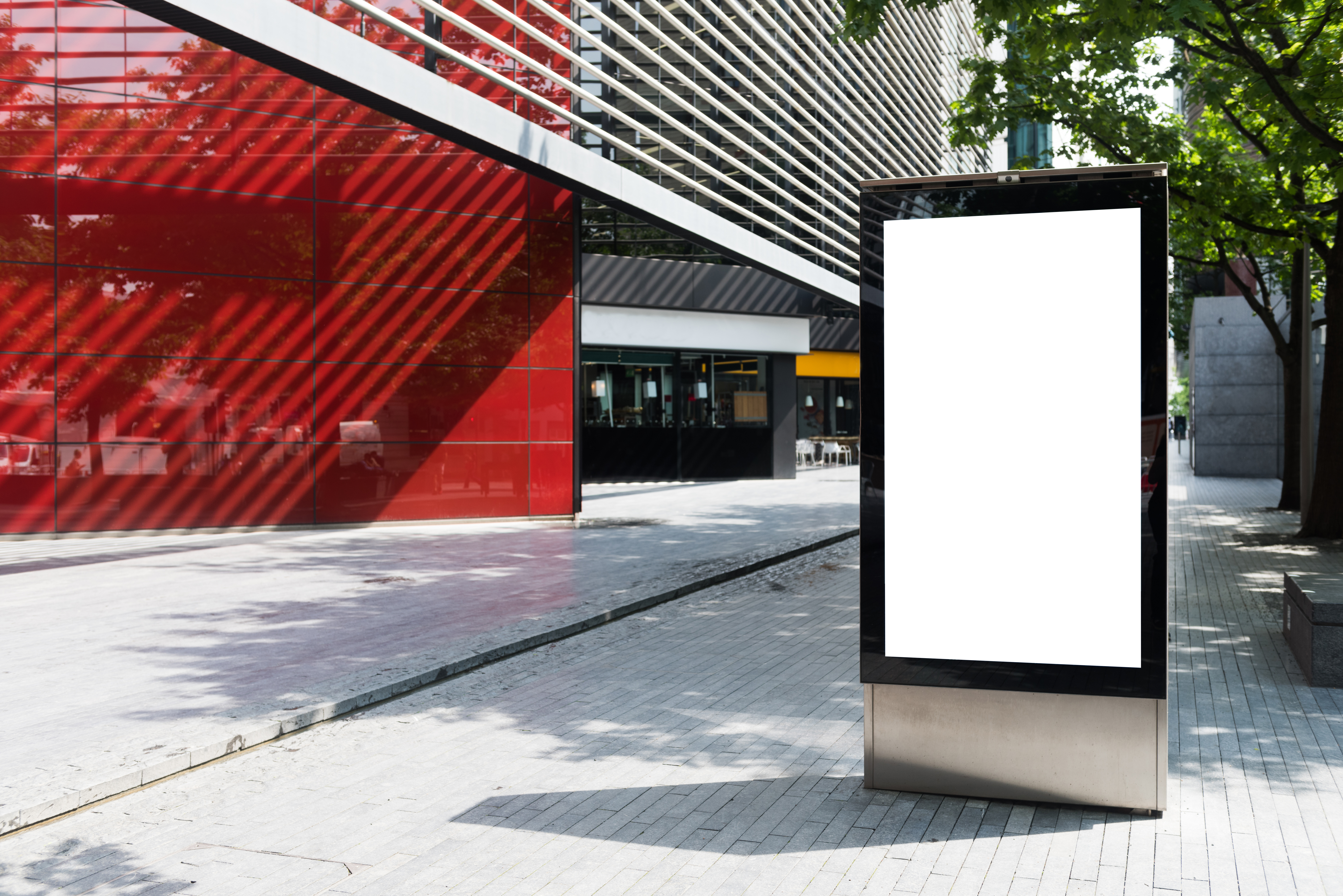 A blank billboard on a street